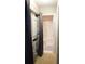 Efficient bath and laundry area with combined shower and tub at 411 Bloom Ct # 2A, Sun City Center, FL 33573