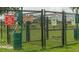 Fenced dog park area, creating a dedicated and safe space for pets to exercise and play within the community at 411 Bloom Ct # 2A, Sun City Center, FL 33573