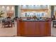 The restaurant is decorated with light tile floors and plenty of tables and chairs at 411 Bloom Ct # 2A, Sun City Center, FL 33573