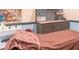 Spa interior showing a treatment bed and storage for equipment and supplies at 411 Bloom Ct # 2A, Sun City Center, FL 33573