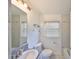 Bathroom featuring a vanity, a large mirror, marble countertops, toilet and shower at 434 Pevetty Dr, Plant City, FL 33563