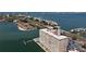 Beautiful aerial view of the waterfront condo complex, pool, private docks, and coastline at 5220 Brittany S Dr # 1108, St Petersburg, FL 33715