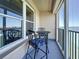 Relax on this balcony with a table and chairs while enjoying serene water views at 5220 Brittany S Dr # 1108, St Petersburg, FL 33715