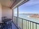 Balcony offering panoramic water views, complete with a table and chairs at 5220 Brittany S Dr # 1108, St Petersburg, FL 33715
