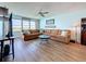 Inviting living room featuring comfortable sectional sofa, and city views at 5220 Brittany S Dr # 1108, St Petersburg, FL 33715
