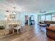 Open-concept living space with adjacent dining area and spacious seating at 5220 Brittany S Dr # 1108, St Petersburg, FL 33715