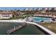 Waterfront pool featuring lounge chairs and bay views at 5220 Brittany S Dr # 1108, St Petersburg, FL 33715