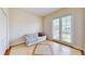 Cozy bonus room with a comfortable sofa and access to an outdoor balcony or patio at 5709 Sea Turtle Pl, Apollo Beach, FL 33572