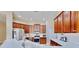 Modern kitchen with stainless steel appliances, sleek countertops, and ample cabinet space for cooking enthusiasts at 5709 Sea Turtle Pl, Apollo Beach, FL 33572