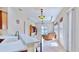 Bright, open living room with natural light, stylish decor, and seamless kitchen access at 5709 Sea Turtle Pl, Apollo Beach, FL 33572