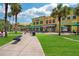 Beautiful view of the town center with outdoor seating and palm trees at 5710 Kingletsound Pl, Lithia, FL 33547