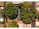 Overhead aerial view of home showing mature landscaping, backyard pool, and surrounding neighborhood at 6690 33Rd N Ave, St Petersburg, FL 33710