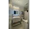 Bathroom featuring vanity with bright mirror, updated fixtures, and shower at 6690 33Rd N Ave, St Petersburg, FL 33710
