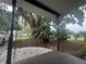Inviting covered front porch with stone walkway and lush tropical landscaping at 6690 33Rd N Ave, St Petersburg, FL 33710