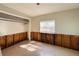Bedroom featuring tile flooring and exposed wall studs ready for renovation, offering customization potential at 6708 S Faul St, Tampa, FL 33616