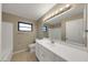 Large bathroom with tub, shower, and double vanity at 6901 298Th N Ave, Clearwater, FL 33761