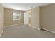 Neutral bedroom with large window and attached bathroom at 6901 298Th N Ave, Clearwater, FL 33761