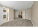 Spacious carpeted room with double doors and walk-in closet at 6901 298Th N Ave, Clearwater, FL 33761