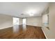 Bright living room featuring hardwood floors and neutral paint, creating an inviting atmosphere at 6901 298Th N Ave, Clearwater, FL 33761