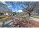 Community playground featuring modern equipment, a fenced area, and a safe environment for children to play at 7007 Blue Beech Dr, Riverview, FL 33578