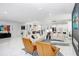 Bright, airy living room with marble floors, modern decor, and an open layout, perfect for entertaining at 7403 Edgemere Rd, Tampa, FL 33625