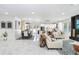 Spacious living room with marble floors, modern decor, an open layout to dining and kitchen at 7403 Edgemere Rd, Tampa, FL 33625