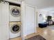 Conveniently stacked washer and dryer units inside a closet, providing a practical laundry solution at 105 4Th Ne Ave # 501, St Petersburg, FL 33701