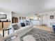 Bright living room featuring an open layout, hardwood floors, and access to a balcony at 105 4Th Ne Ave # 501, St Petersburg, FL 33701