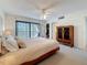 Bright main bedroom with a walk-in closet and balcony access at 105 4Th Ne Ave # 501, St Petersburg, FL 33701