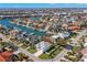 Aerial view of the property highlighting the home's location in a waterfront community with boat access at 107 8Th E St, Tierra Verde, FL 33715