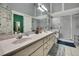 Bright bathroom with double vanity, modern fixtures, and a separate shower at 11321 Copley Ct, Spring Hill, FL 34609