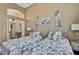 Bedroom featuring twin beds and beach themed decor at 11321 Copley Ct, Spring Hill, FL 34609