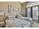 Inviting bedroom with two twin beds and coastal-themed decor at 11321 Copley Ct, Spring Hill, FL 34609