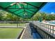 Inviting community bocce ball court area with shade cover and bench seating at 11321 Copley Ct, Spring Hill, FL 34609