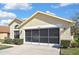 Charming single-story home featuring a two car screened garage with a freshly sealed driveway at 11321 Copley Ct, Spring Hill, FL 34609