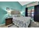 Comfortable main bedroom with a coastal-inspired design and plenty of natural light at 11321 Copley Ct, Spring Hill, FL 34609