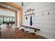 Well-designed foyer with built-in shoe storage, hooks, and direct access to the bright living spaces at 13103 Wildflower Meadow Dr, Riverview, FL 33579
