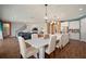 Open concept view of living room and kitchen with modern accents at 13103 Wildflower Meadow Dr, Riverview, FL 33579