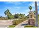 Community entrance showcasing lush landscaping and a grand entrance structure at 16232 Amethyst Key Dr, Wimauma, FL 33598