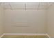 Spacious walk-in closet featuring wire shelving for optimal storage solutions at 16232 Amethyst Key Dr, Wimauma, FL 33598