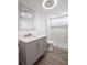 Bathroom showcasing modern vanity, glass enclosed shower, and recessed lighting at 163 Dolphin E Dr, Oldsmar, FL 34677