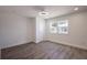 Bright bedroom with modern ceiling fan and natural light coming in from the window at 163 Dolphin E Dr, Oldsmar, FL 34677