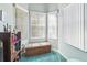 Bright bonus room with natural light and a cozy reading nook at 18739 Bascomb Ln, Hudson, FL 34667