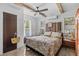 Sunlit bedroom with decorative headboard and exposed beams at 2227 29Th S St, St Petersburg, FL 33712