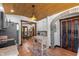 Spacious kitchen with terracotta tile floors, white cabinets, and modern appliances at 2227 29Th S St, St Petersburg, FL 33712