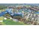 Aerial view of the condo complex showing the golf course, lakes, and surrounding community at 2333 Feather Sound Dr # A308, Clearwater, FL 33762