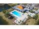 Aerial view of the community clubhouse, pool, hot tub, and adjacent waterways at 2333 Feather Sound Dr # A308, Clearwater, FL 33762