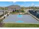 Community basketball court featuring new backboards, lush landscaping, and easy access to other amenities at 3107 Mountain Spruce Ter, Wesley Chapel, FL 33543