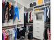 Spacious walk-in closet with custom shelving, hanging racks, and ample storage at 3107 Mountain Spruce Ter, Wesley Chapel, FL 33543