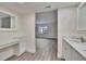 Bright bathroom area featuring vanity with a large counter space at 313 Martha Ln # 4, Oldsmar, FL 34677